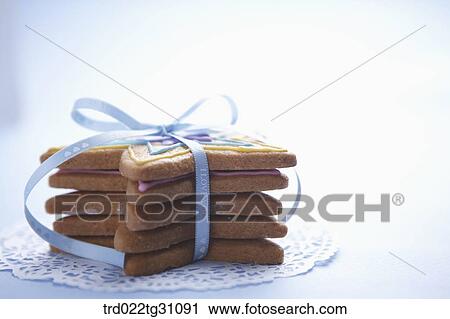 The star shaped cookie with the blue ribbon View Large Photo Image Stock Image - The star shaped cookie with the blue ribbon . Fotosearch