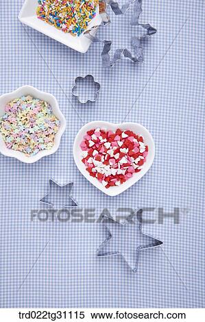 Stock Photography - The various types of decorating sugar and cookie cutter. Fotosearch