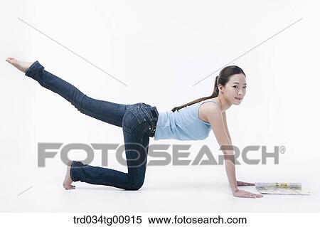 The woman stretching her leg View Large Photo Image Stock Photography - The woman stretching her leg. Fotosearch
