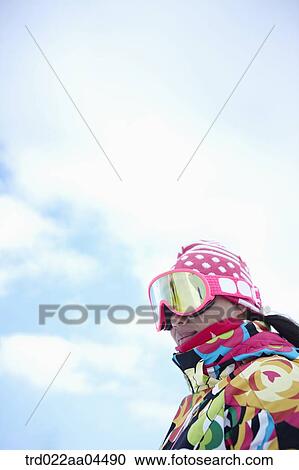 The woman wearing the skiwear View Large Photo Image Stock Image - The woman wearing the skiwear. Fotosearch
