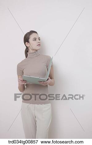 Stock Photo - The woman with the document. Fotosearch