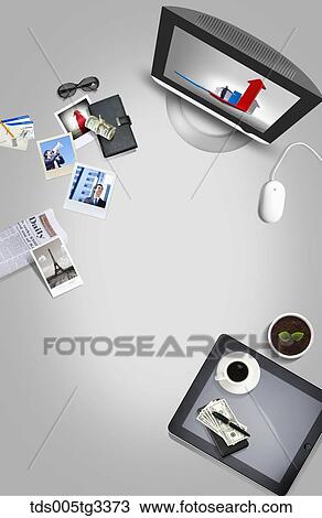Drawing - The businessman desk with various stuffs around. Fotosearch