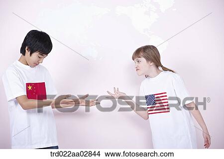 A Chinese student and American student having discussion View Large Photo Image Picture - A Chinese student and American student having discussion. Fotosearch