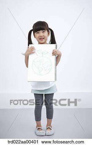 A girl holding green globe painting View Large Photo Image Stock Image - A girl holding green globe painting. Fotosearch