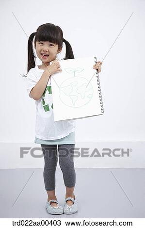 Stock Image - A girl holding green globe painting. Fotosearch