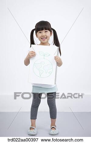 A girl holding green globe painting View Large Photo Image Stock Photo - A girl holding green globe painting. Fotosearch