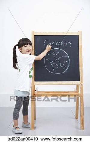 A girl painting green globe on blackboard View Large Photo Image Stock Image - A girl painting green globe on blackboard . Fotosearch
