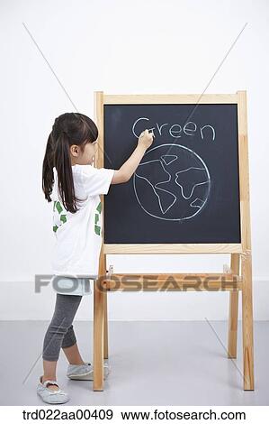 A girl painting green globe on blackboard View Large Photo Image Stock Photo - A girl painting green globe on blackboard . Fotosearch