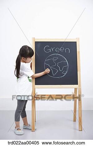A girl painting green globe on blackboard View Large Photo Image Stock Photography - A girl painting green globe on blackboard . Fotosearch