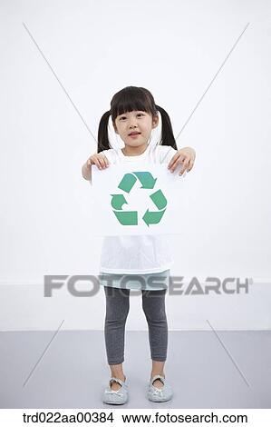 A girl wearing recycling shirt with recycling mark View Large Photo Image Picture - A girl wearing recycling shirt with recycling mark . Fotosearch