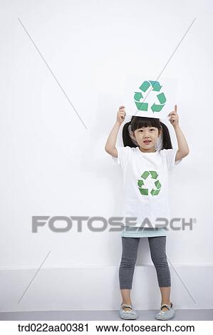A girl wearing recycling shirt with recycling mark View Large Photo Image Stock Image - A girl wearing recycling shirt with recycling mark . Fotosearch