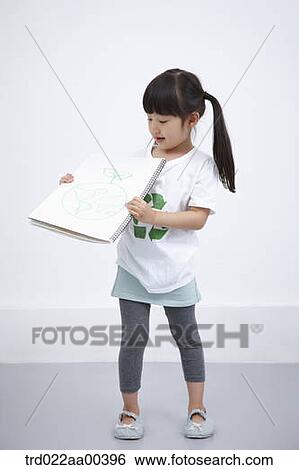 A girl wearing recycling shirt with green globe painting View Large Photo Image Stock Photograph - A girl wearing recycling shirt with green globe painting. Fotosearch