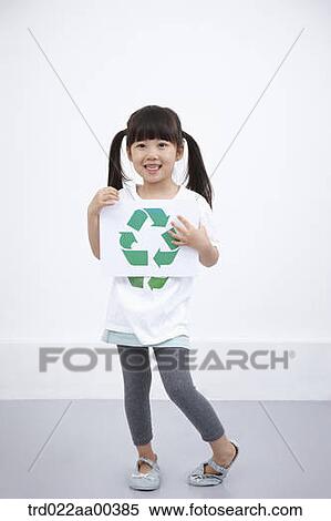 A girl wearing recycling shirt with recycling mark View Large Photo Image Stock Photography - A girl wearing recycling shirt with recycling mark . Fotosearch
