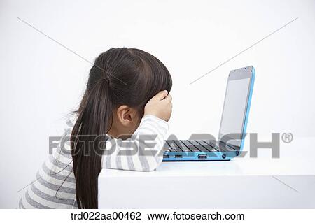 A girl with blue laptop View Large Photo Image Stock Image - A girl with blue laptop . Fotosearch