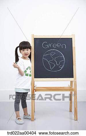A girl with green globe painting on blackboard View Large Photo Image Picture - A girl with green globe painting on blackboard . Fotosearch