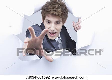 A man from the torn paper View Large Photo Image Stock Image - A man from the torn paper. Fotosearch