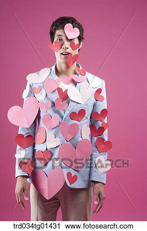 A man putting heart on the body View Large Photo Image Stock Image - A man putting heart on the body. Fotosearch