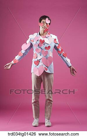 A man putting heart on the body View Large Photo Image Stock Photograph - A man putting heart on the body. Fotosearch