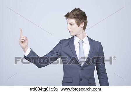 Stock Photography - A man with his finger up . Fotosearch