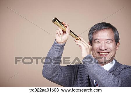 A smiling old man with telescope View Large Photo Image Stock Image - A smiling old man with telescope. Fotosearch