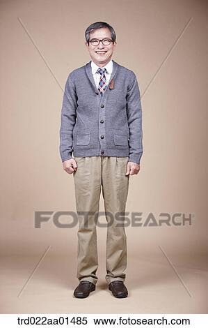 A standing old man View Large Photo Image Stock Photography - A standing old man . Fotosearch