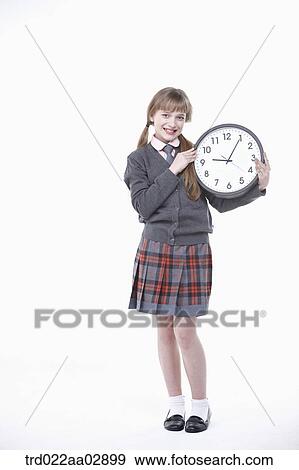 An American student with clock View Large Photo Image Stock Photo - An American student with clock. Fotosearch