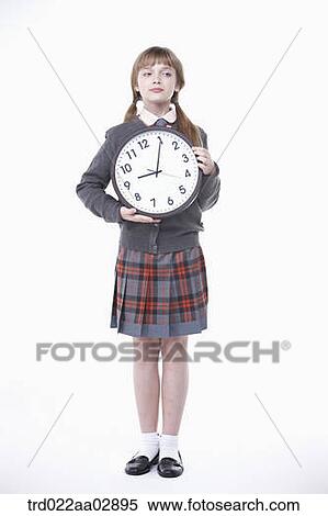 An American student with clock View Large Photo Image Stock Photography - An American student with clock. Fotosearch