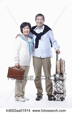An old couple going on travel View Large Photo Image Picture - An old couple going on travel . Fotosearch