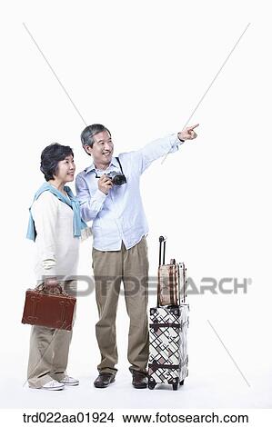 Picture - An old couple going on travel . Fotosearch