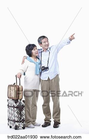 Stock Image - An old couple going on travel . Fotosearch
