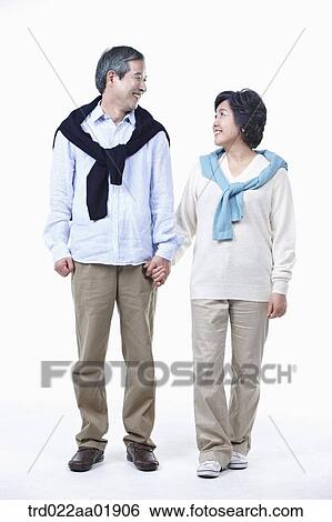 An old couple looking at each other View Large Photo Image Stock Photograph - An old couple looking at each other. Fotosearch