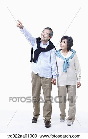 An old couple looking at the sky View Large Photo Image Stock Photo - An old couple looking at the sky . Fotosearch