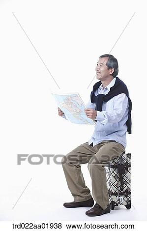 Stock Photo - An old man going on travel . Fotosearch
