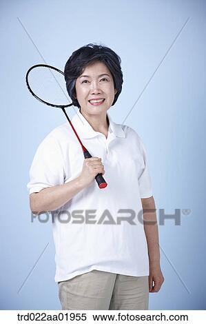 An old woman with badminton racket View Large Photo Image Stock Photography - An old woman with badminton racket . Fotosearch