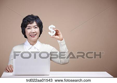 An old woman with money and laptop View Large Photo Image Stock Image - An old woman with money and laptop . Fotosearch