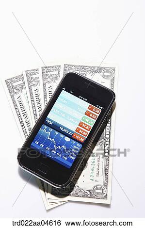 Smartphone and money View Large Photo Image Stock Photograph - Smartphone and money . Fotosearch