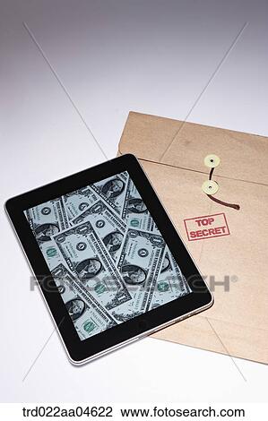 Tablet PC showing dollar and Top secret envelope View Large Photo Image Stock Image - Tablet PC showing dollar and Top secret envelope. Fotosearch