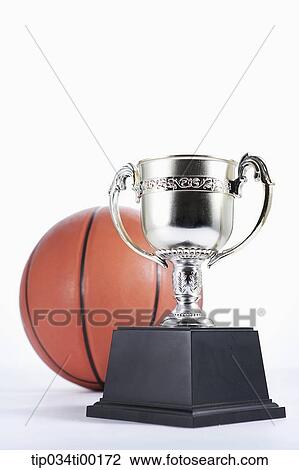 The basketball and trophy View Large Photo Image Stock Image - The basketball and trophy. Fotosearch