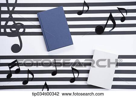 The blue and white cover books on the score View Large Photo Image Stock Image - The blue and white cover books on the score. Fotosearch