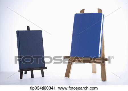 The blue cover book on the easel View Large Photo Image Stock Image - The blue cover book on the easel . Fotosearch