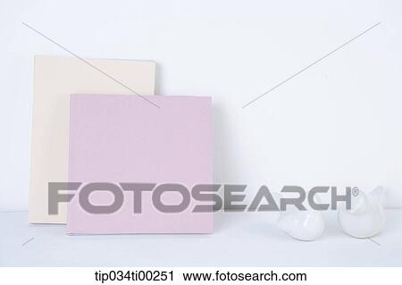Stock Image - The book and bird decoration. Fotosearch