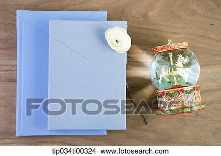 The book, white flower, and decoration ball View Large Photo Image Picture - The book, white flower, and decoration ball. Fotosearch
