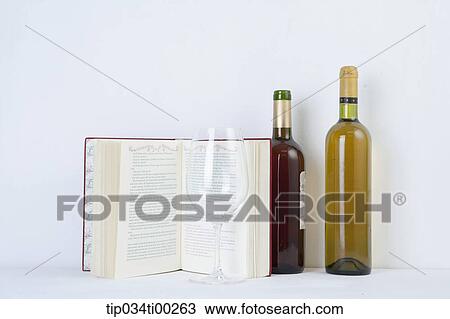 The book, wine glass, and bottles of wine View Large Photo Image Stock Image - The book, wine glass, and bottles of wine. Fotosearch