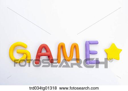 The colorful clay 'GAME' with star  View Large Photo Image Stock Photo - The colorful clay 'GAME' with star . Fotosearch