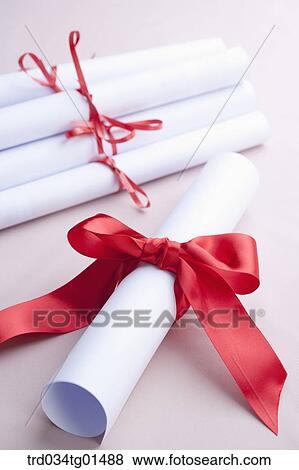 The diploma with red ribbon View Large Photo Image Stock Photo - The diploma with red ribbon . Fotosearch