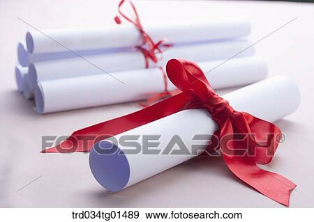 The diploma with red ribbon View Large Photo Image Stock Photo - The diploma with red ribbon . Fotosearch