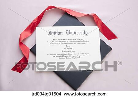 The diploma with red string View Large Photo Image Picture - The diploma with red string. Fotosearch