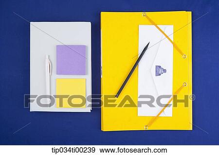 Stock Photo - The file folder, pencil, sticky note, and pen. Fotosearch