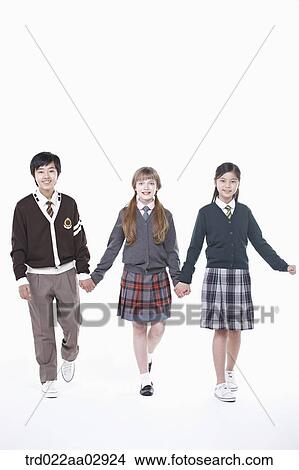 The global students holding hands together View Large Photo Image Picture - The global students holding hands together. Fotosearch