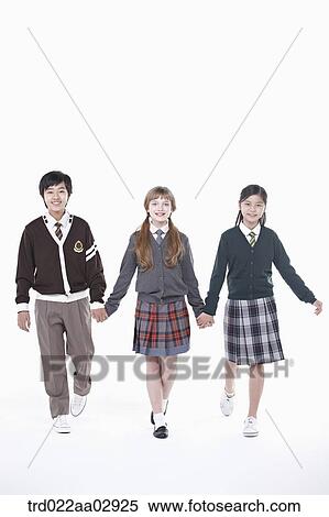 Stock Photography - The global students holding hands together. Fotosearch